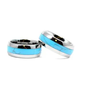 Two rings with a blue stripe on them.