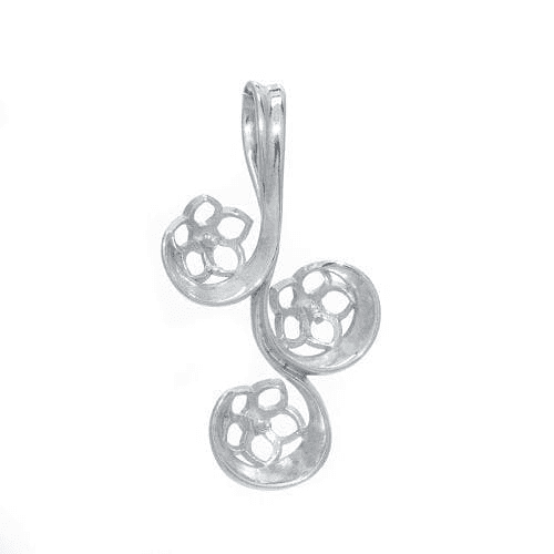 A silver treble clef with three holes in it.