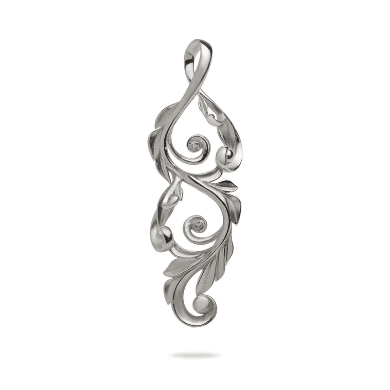 A silver pendant with a leaf design on it.